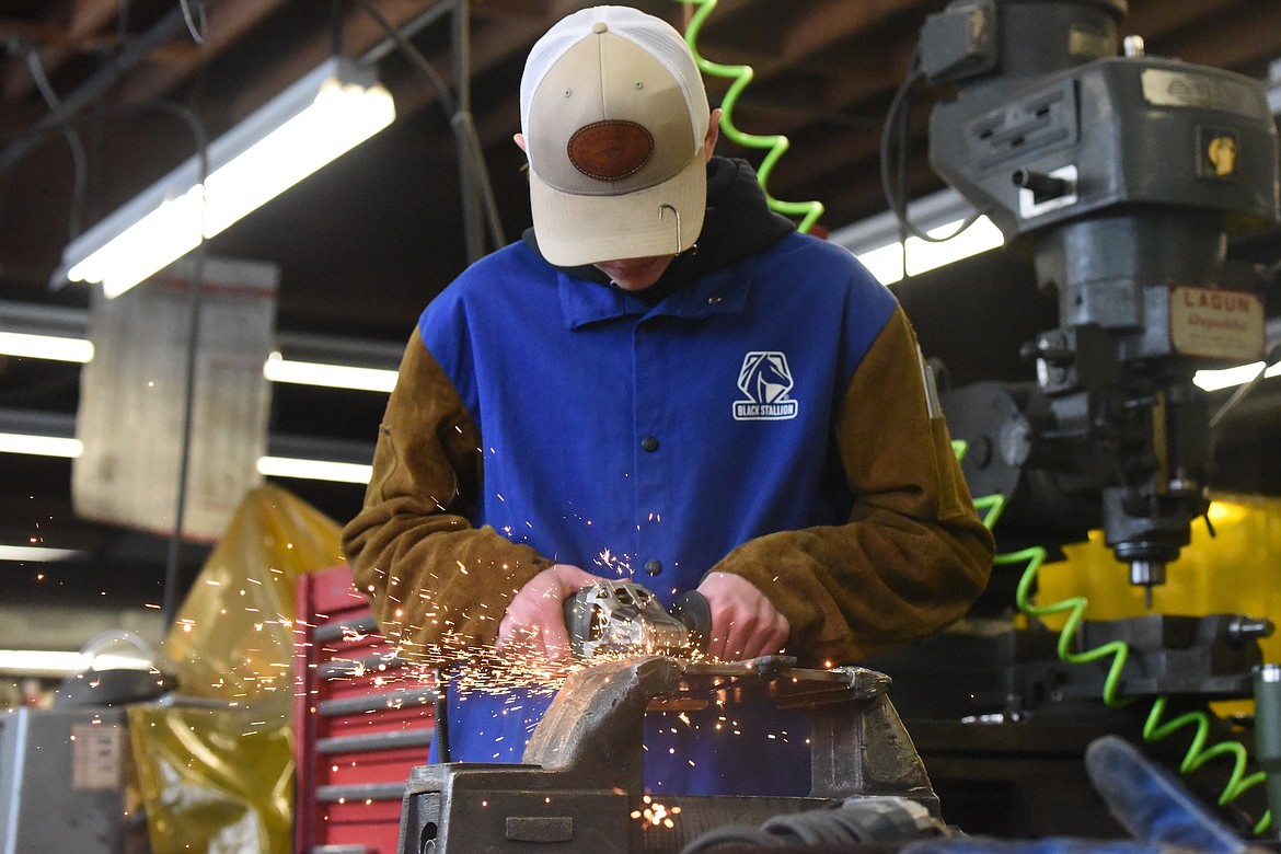 Khonnor Peterson works on his G1 welding test at Libby Middle High School Tuesday, Jan. 25, 2023. (Scott Shindledecker/The Western News)