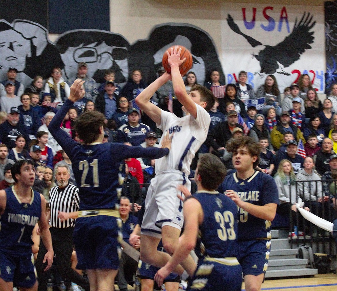 Asher Williams shoots a jumper against Timberlake at the Backwoods Brawl on Jan. 20. For the fourth game in a row, Williams scored 30 points.