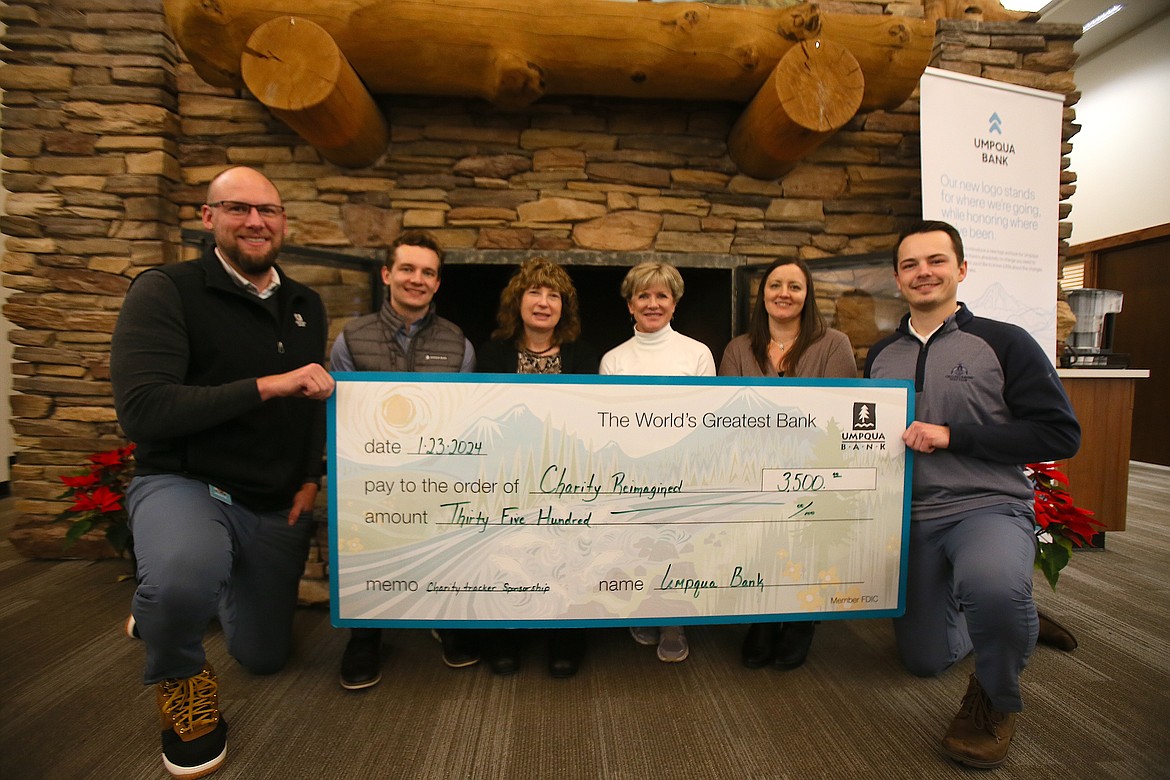 Umpqua Bank donated $3,500 to Charity Reimagined during a presentation Tuesday. Umpqua is the first corporate sponsor for the North Idaho CharityTracker, an online resource and referral tool used by 76 local nonprofits and growing. From left: Jason Steenstra, manager of Umpqua Coeur d'Alene; Connor Skinner, commercial underwriting manager; Judy Coe, relationship manager and Charity Reimagined board member; Maggie Lyons, Charity Reimagined founder; Aly Edwards, Charity Reimagined programs manager; and Clayton Carter, commercial lender.