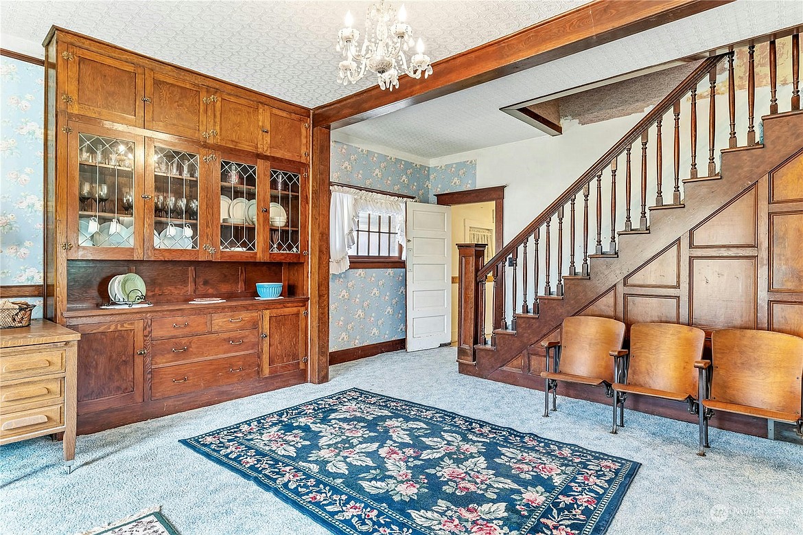 A room in the former mayor’s house in Hatton featuring original handmade wood furnishings, including both the stairs and the china cabinet against the wall, according to current owner Dell Palmer.