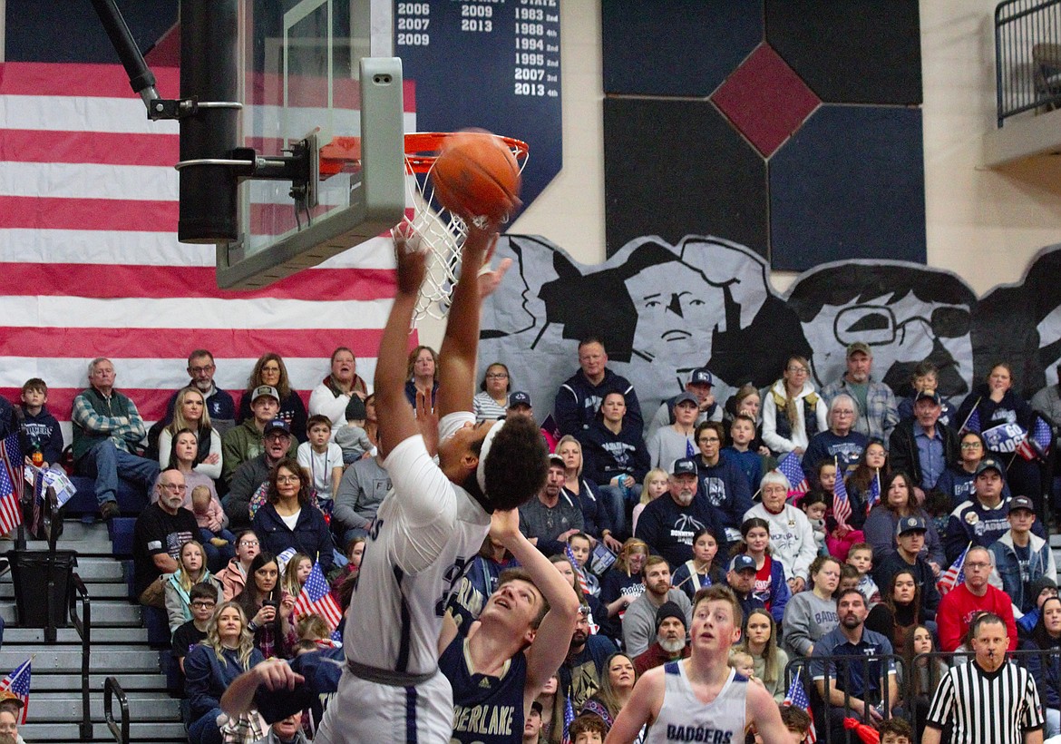 Sulay Abubakari scores a layin for the Badgers at the Backwoods Brawl.