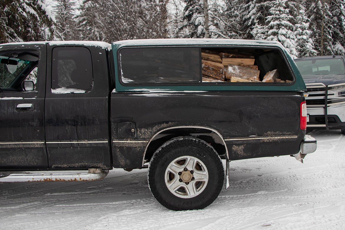 A full truck waits to deliver wood to a family in need at the St Michael & All Angels Wood Ministry in Fortine on Jan. 20, 2024. (Kate Heston/Daily Inter Lake)