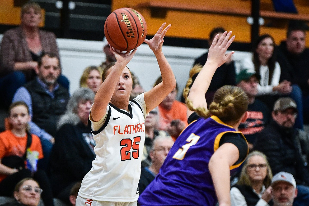 Flathead's Chloe Converse (25) knocks down one of her five three-pointers in the first half against Missoula Sentinel at Flathead High School on Thursday, Jan. 25. (Casey Kreider/Daily Inter Lake)