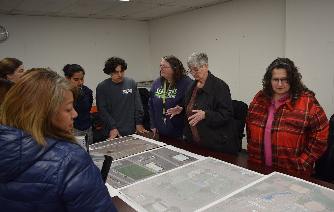 Warden community members and Washington State University’s Rural Communities Design Initiative student interns work together to brainstorm ideas for Warden’s parks during Tuesday’s Community Engagement Workshop.