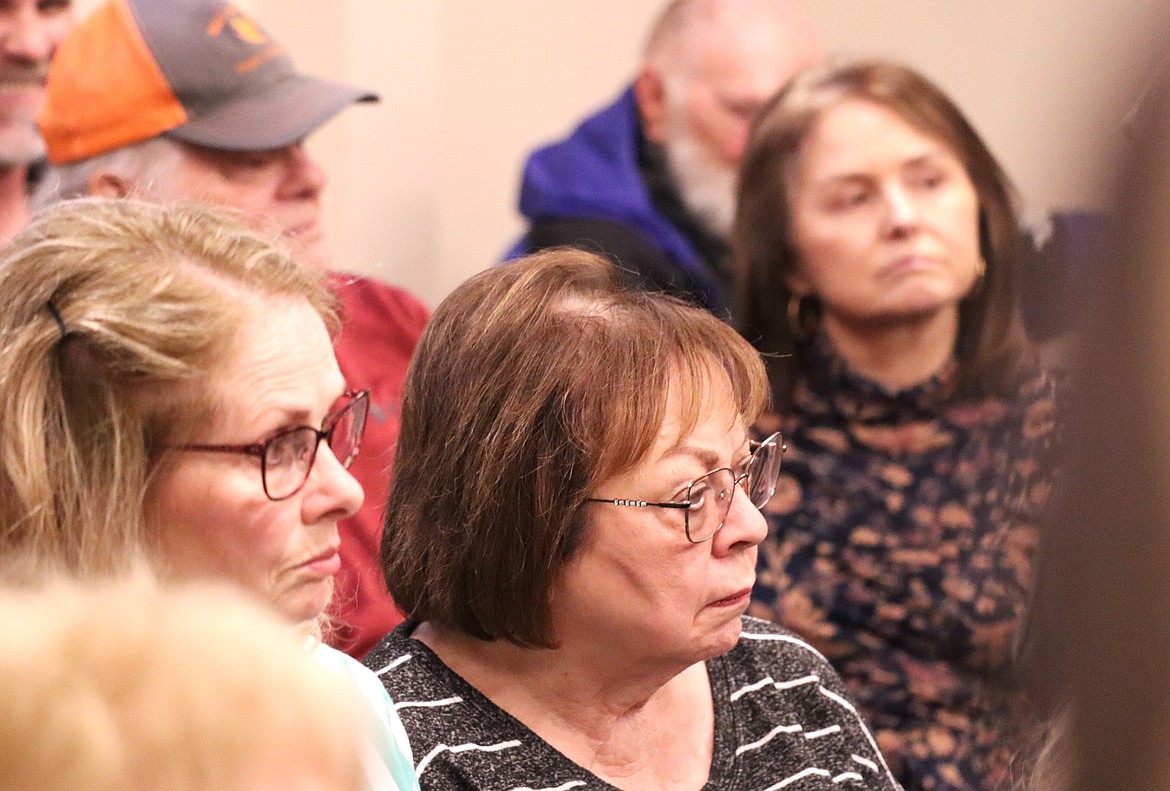 Residents listen to plans for a Marriott hotel in downtown Coeur d'Alene during Thursday's Design Review Commission meeting on Thursday at City Hall.