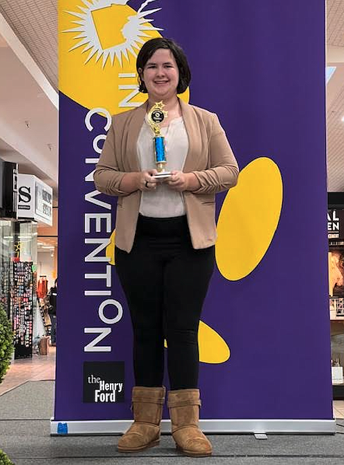 Lakeland Middle Schooler Elizabeth McCormick is seen Sunday during the Invent Idaho North Idaho Regional competition awards ceremony at the Silver Lake Mall. She won best of show for fifth through eighth grades for her invention, "Drink-A-Drop."
