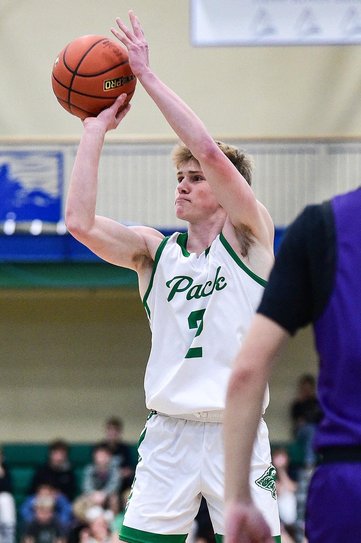 Glacier's Liam Ells (2) knocks down a three in the first quarter against Missoula Sentinel at Glacier High School on Saturday, Jan. 27. (Casey Kreider/Daily Inter Lake)