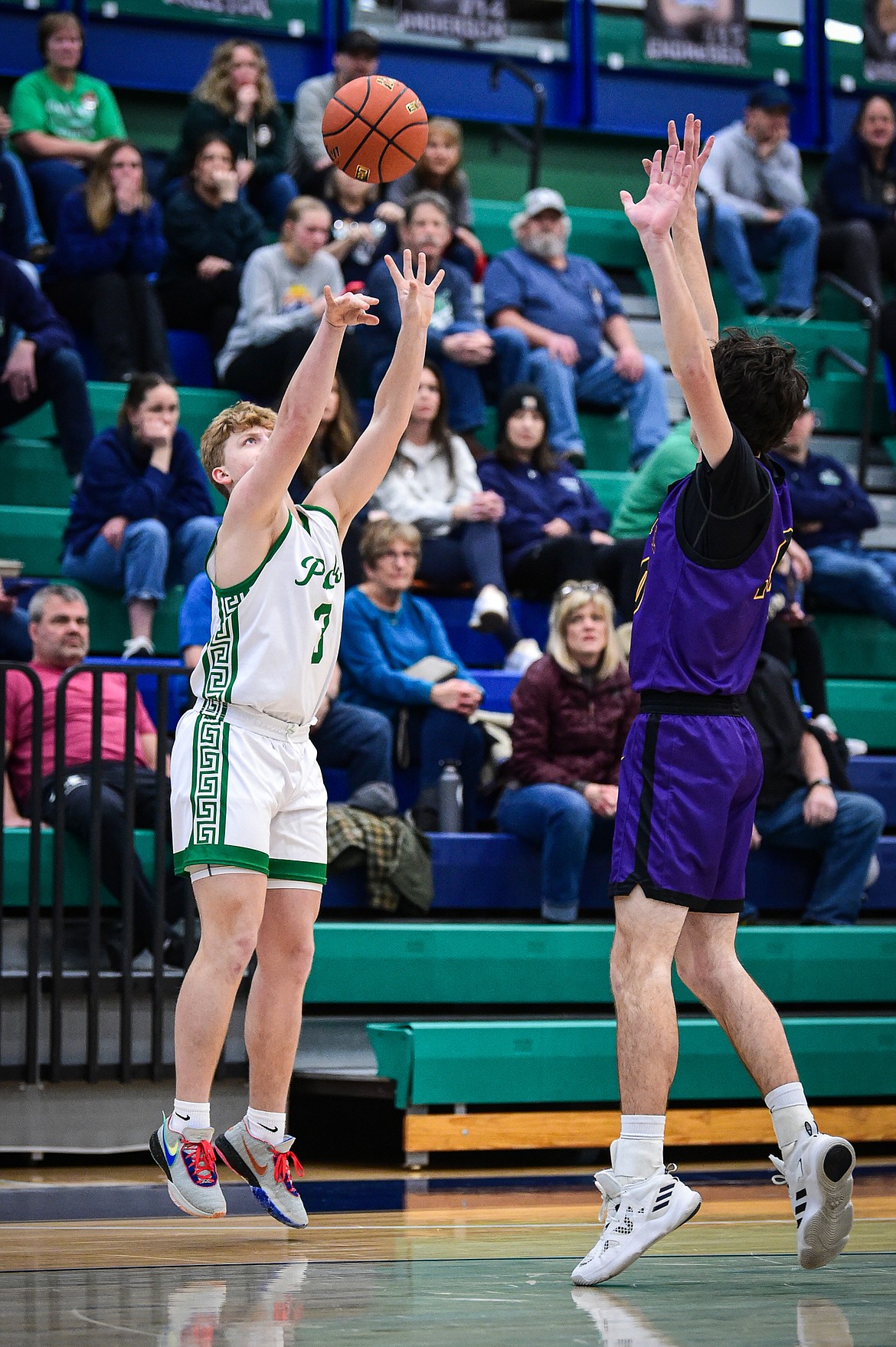 Glacier's Luke Nikunen (3) shoots a three in the first half against Missoula Sentinel at Glacier High School on Saturday, Jan. 27. (Casey Kreider/Daily Inter Lake)