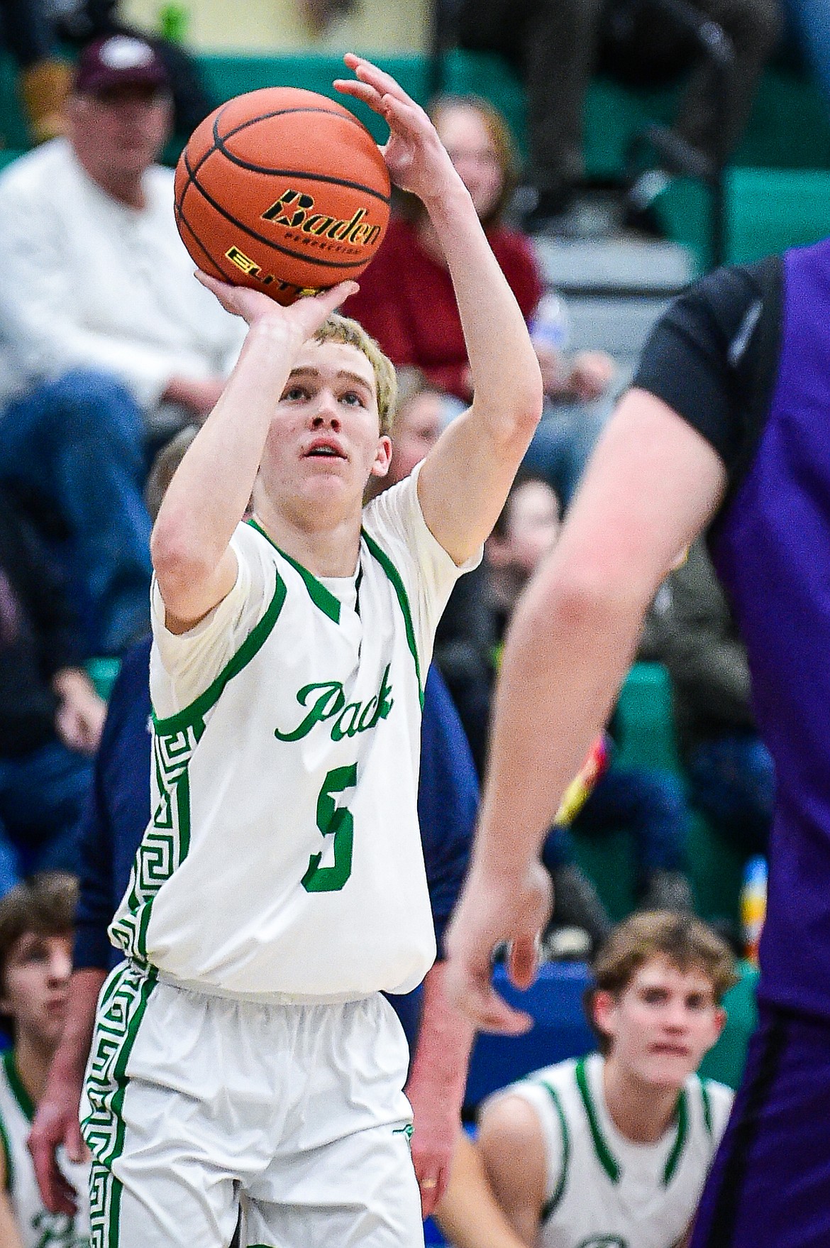 Glacier's Easton Kauffman (5) knocks down a three in the second half against Missoula Sentinel at Glacier High School on Saturday, Jan. 27. (Casey Kreider/Daily Inter Lake)