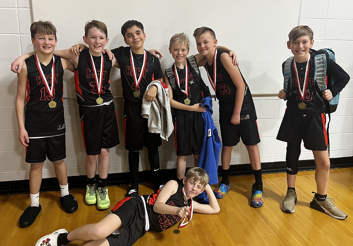 Courtesy photo
The North Idaho Heat went undefeated to win first place last weekend in the fifth grade boys division of the Sandpoint Future Invitational basketball tournament. In the front is Kellan Larson; and back row from left, Mac Roberts, Camden Glindeman, Ben Owen, Micah Brumbach, Ty Hamilton and Keaton Knoll. Not pictured are Jaxon Pope and coaches Pete Roberts and Jon Larson.