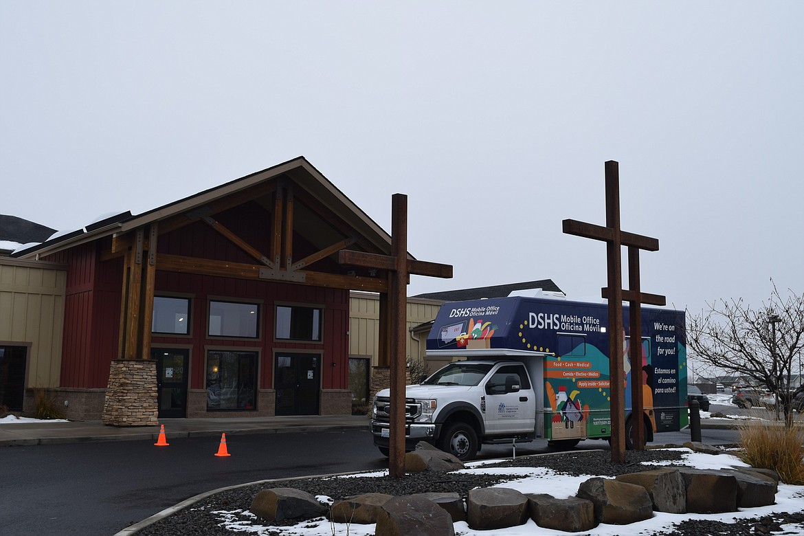 The Washington State Department of Social and Health Services’s Mobile Community Services Office sits in front of the Othello Church of the Nazarene, the venue for Thursday’s Othello Matters outreach event.