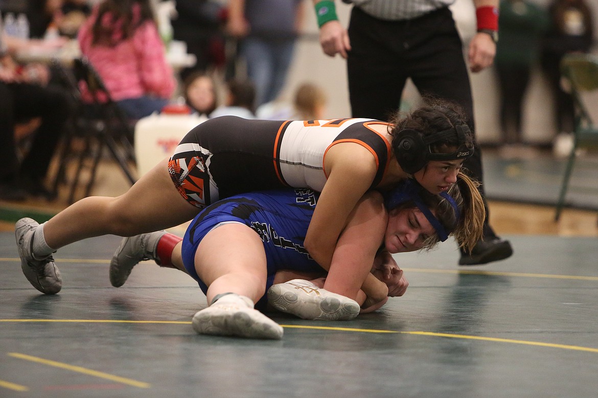 Ephrata senior Leslie Sanchez Guerrero, top, won the 140-pound bracket with a third-round pin in the finals.