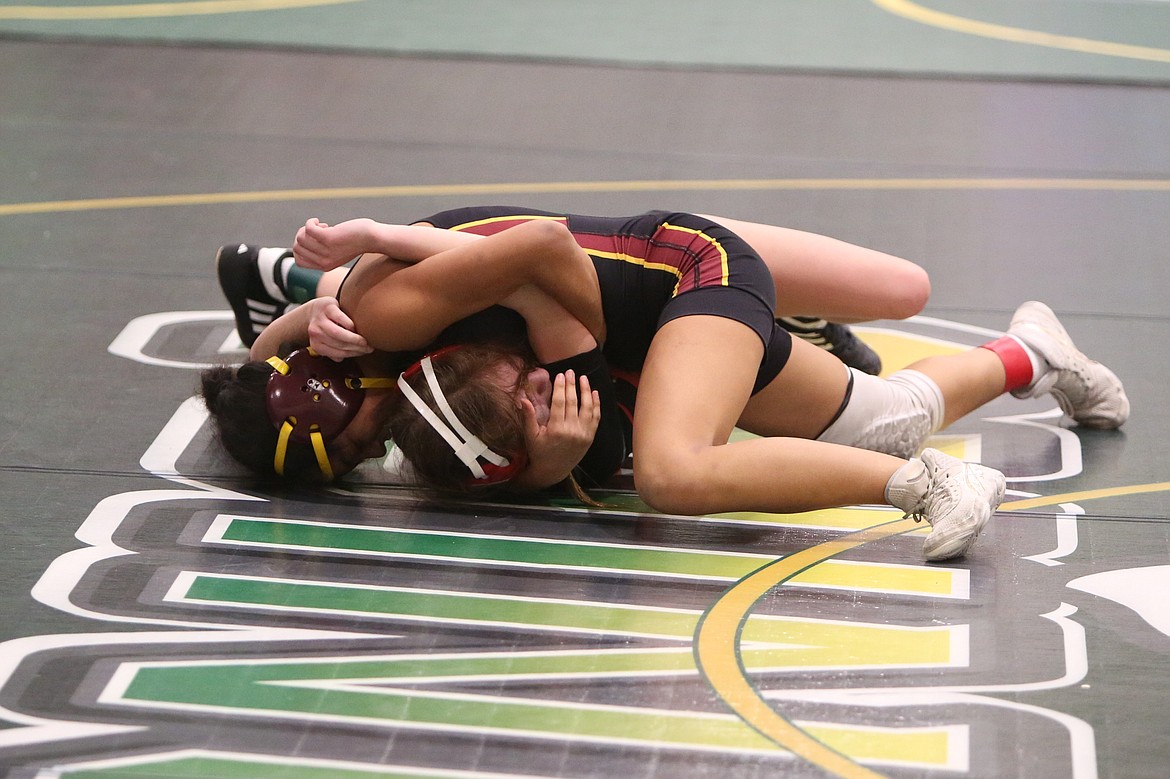 Moses Lake junior Grace Martinez, top, placed fourth at Saturday’s Bring Home Da Beef tournament.