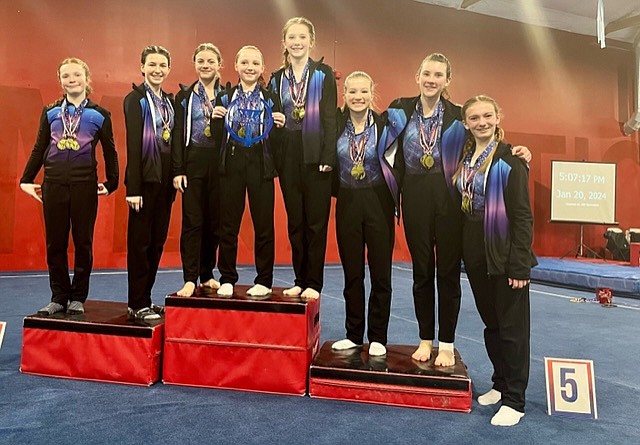 Courtesy photo
The GEMS Athletic Center older Gold gymnastics team at the Free to Flip meet Jan. 20 in Moses Lake, from left, Kallyn O’Brien, Allie Netzel, Sydney Thompson, Elleah Hubbard, Fynlie Reynolds, Emily Wright, Summer Spiker and Ashley Gwin.
