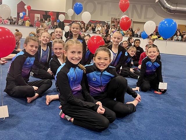 Courtesy photo
GEMS Athletic Center Young Gold and Silver gymnastics team at the Free to Flip meet Jan. 20 in Moses Lake. From left are Ensley Vucinich, Olivia Smith, Olivia Kiser, Ani Hall, Faith Robertson, Kalea Pham, Hunter Bangs, Riley Krebs and Olive Buttars; and front row from left, Baylee Mathews and Kinsley Bodman.