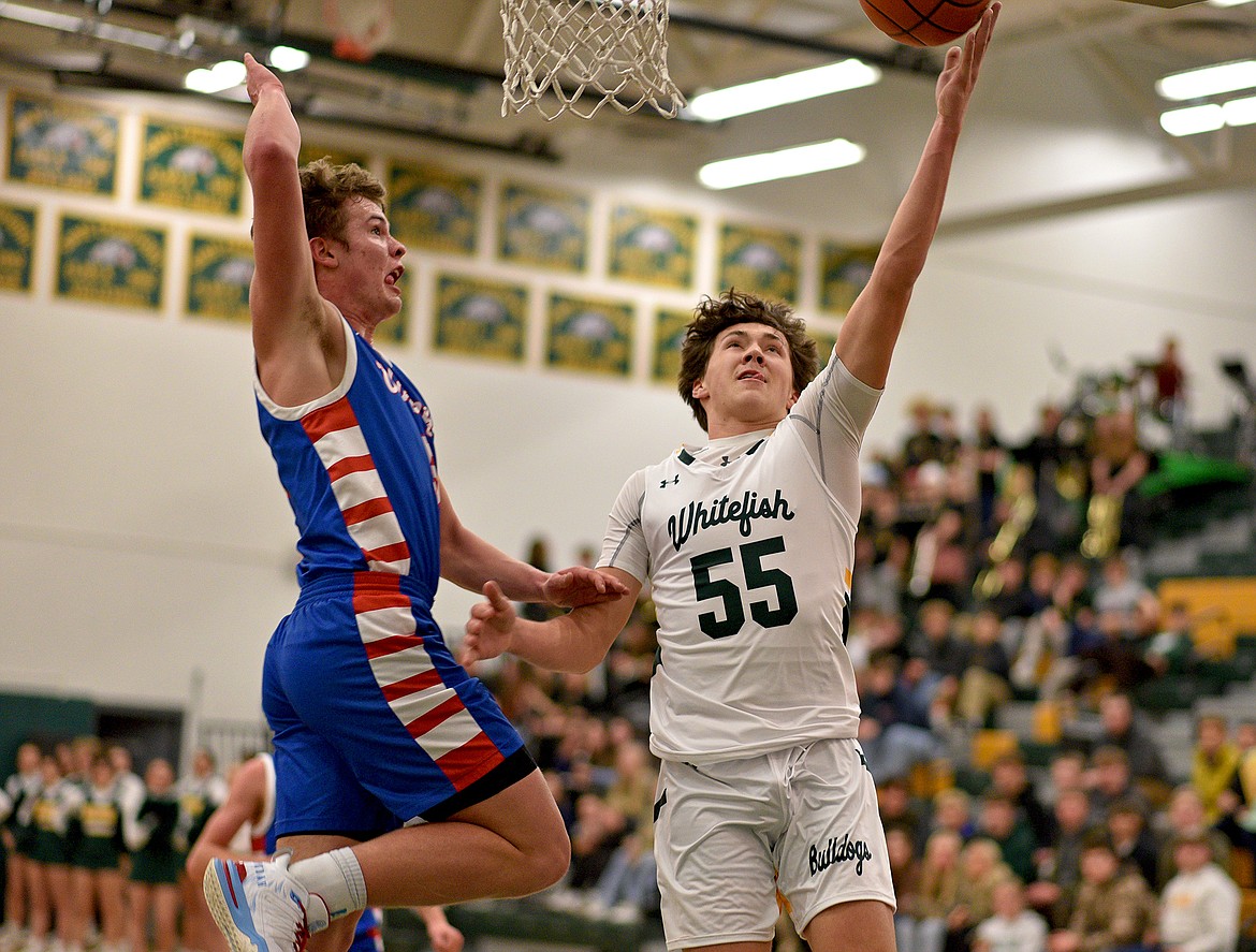 MASON KELCH (55), like his cousin Cohen Kastelitz, leads his team in scoring and rebounding. (Whitefish Pilot photo)