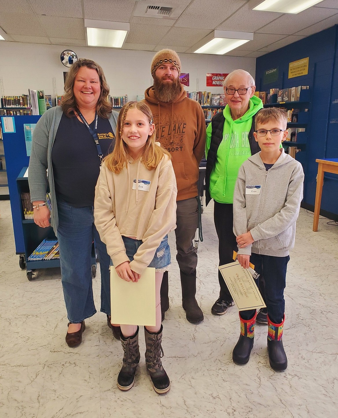 Sixth graders top spellers (left front) Eva Majeski, first place, and Evan Kellogg, second place.