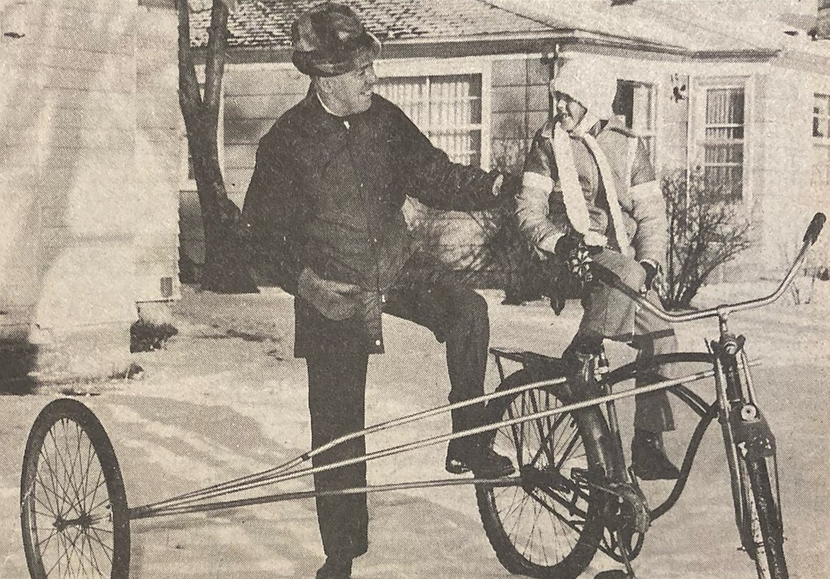 Former Harding principal Duane Harrison, his granddaughter, Jessica, then 7, and his winterized bicycle.