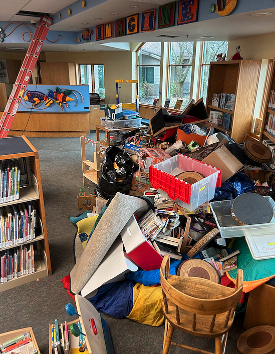 Items are piled up at the Post Falls Library as it undergoes repairs following mid-January winter weather damage and flooding. The destruction caused by freezing in the Post Falls and Athol library buildings is estimated to cost up to $1 million and will take four to six months to repair.