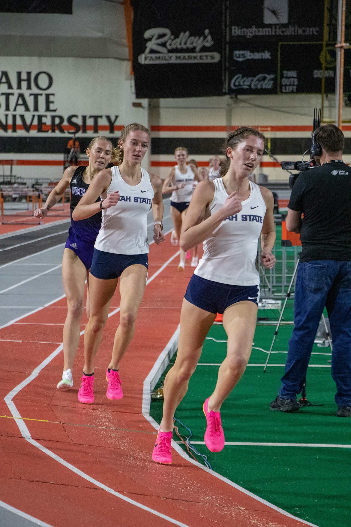 Sandpoint alumni Hannah Davidson (front), now a senior at Utah State University, competes at the Snake River Open held Jan. 11-12 at Idaho State University. At the open, Davidson won the mile in 4:59.07. She now holds the ninth-best time in USU history after Saturday's mile performance at the University of Washington, where she ran a time of 4:49.77.