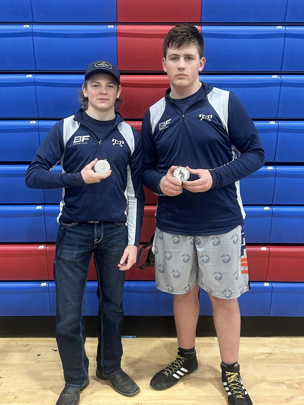 (left) Brandon Williams and Taylor Dodd show off their second place medals at the North Idaho Rumble.