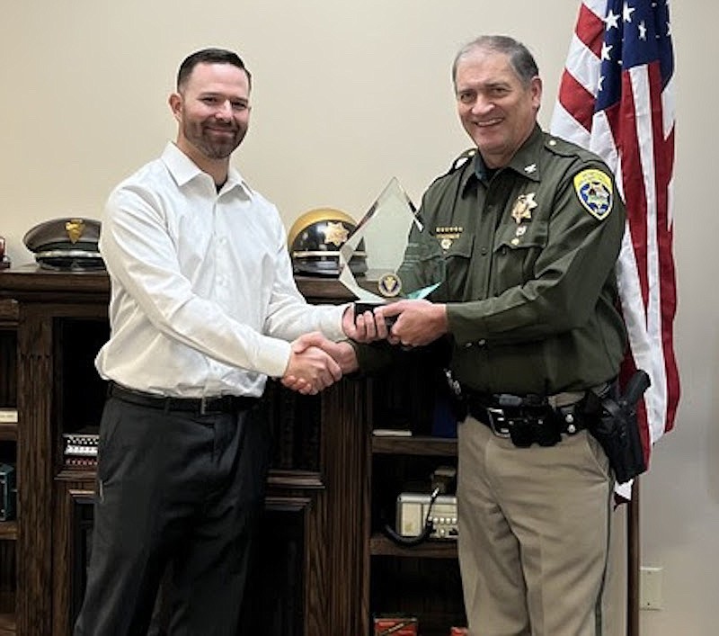 Montana Highway Patrol Trooper Thomas Tafoya with MHP Colonel Steve Lavin following a ceremony where Tafoya received the Medal of Valor, the agency’s highest award for mitigating a hostage situation involving armed robbery suspects. (Courtesy photo)