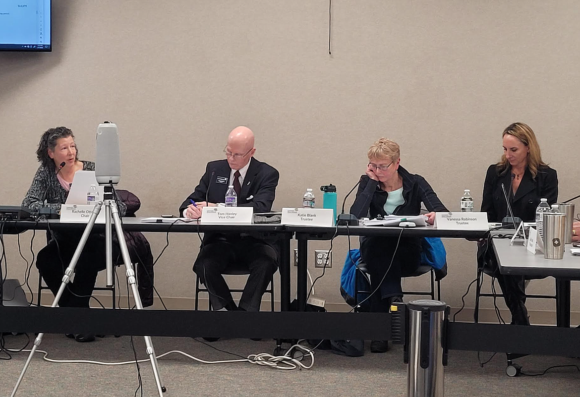 Trustees of the Community Library Network discuss insurance, staffing needs and water damage to two libraries during an emergency meeting Thursday at the Post Falls Library. From left: Rachelle Ottosen, Tom Hanley, Katie Blank and Vanessa Robinson.