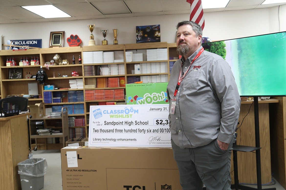 As part of the Classroom Wishlist program, Derek Dickinson received a 3D printer, mobile charging stations, and a Smart TV for the school's library from the Lottery.
