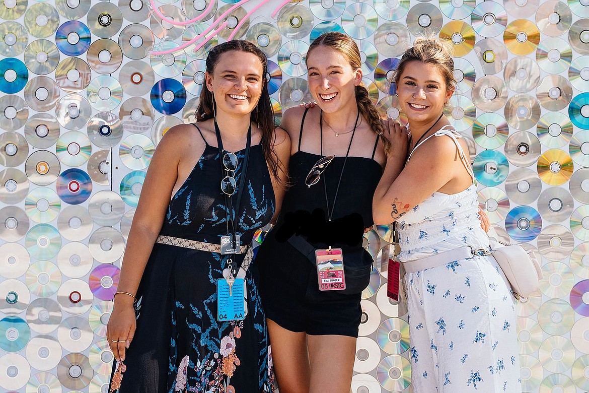 Festival at Sandpoint interns Caroline Hawkins, Eva Binger, and Makenna Caven pose for a photo during a past summer concert series.
