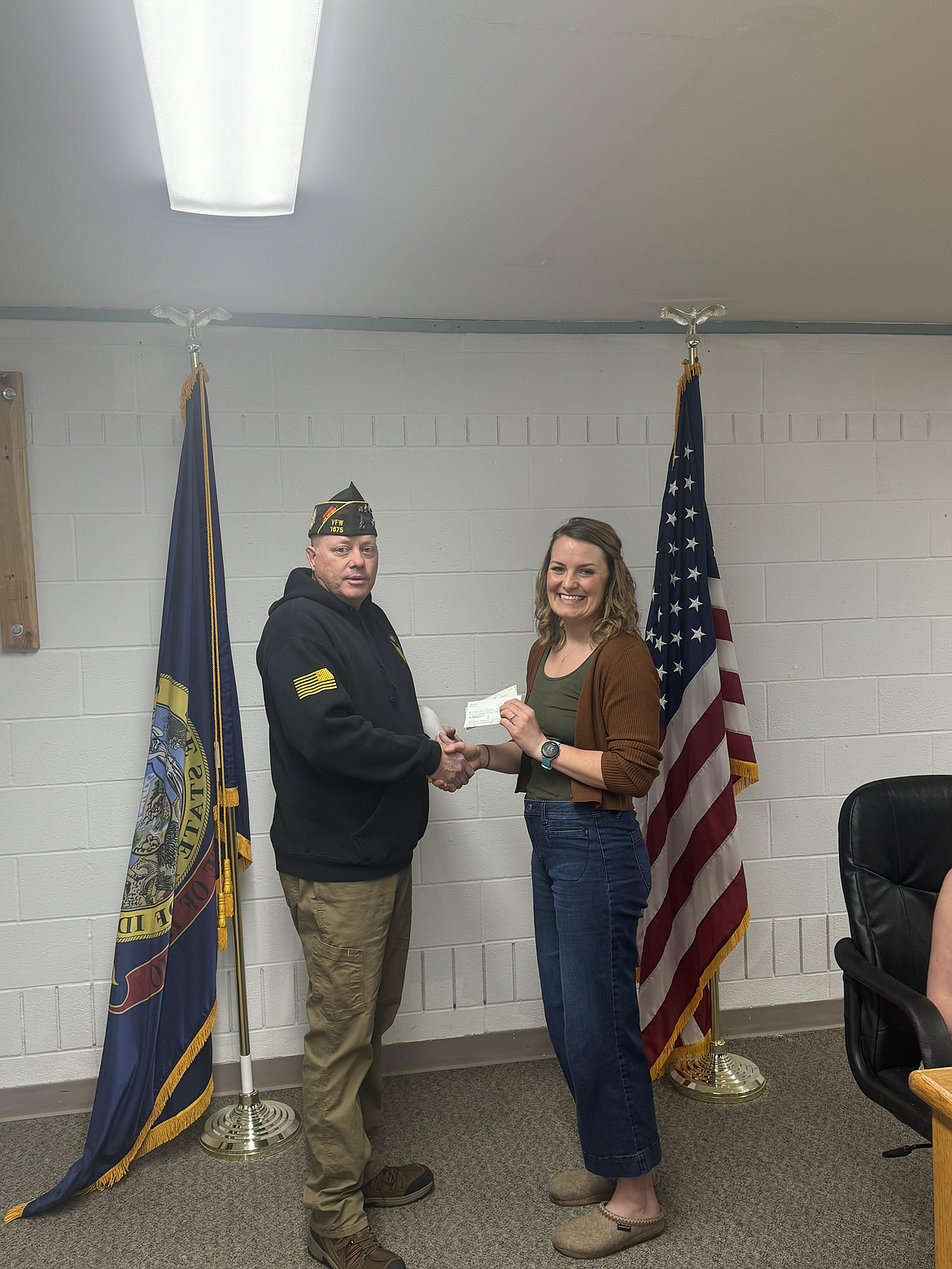 The Osburn VFW presented Kellogg English teacher Kelton Enich with their Teacher of the Year award for modeling good citizenship for students, promoting innovation, connecting students to exciting or helpful resources, and sharing a passion for teaching.