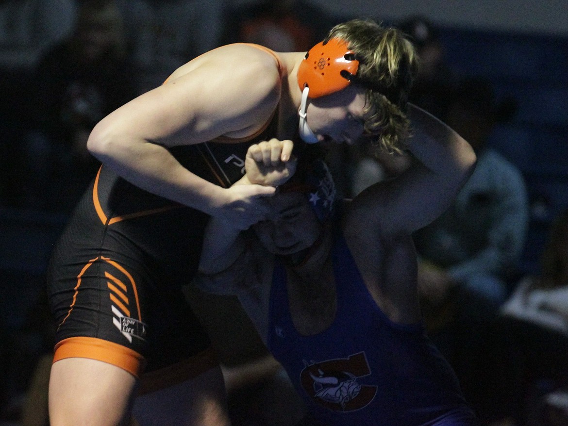 JASON ELLIOTT/Press
Post Falls junior Kendall Sage tries to maintain the upper hand on Coeur d'Alene sophomore Ty Paulin during their match at 195 pounds in Thursday's dual between the schools at Elmer Jordan Court in Coeur d'Alene.