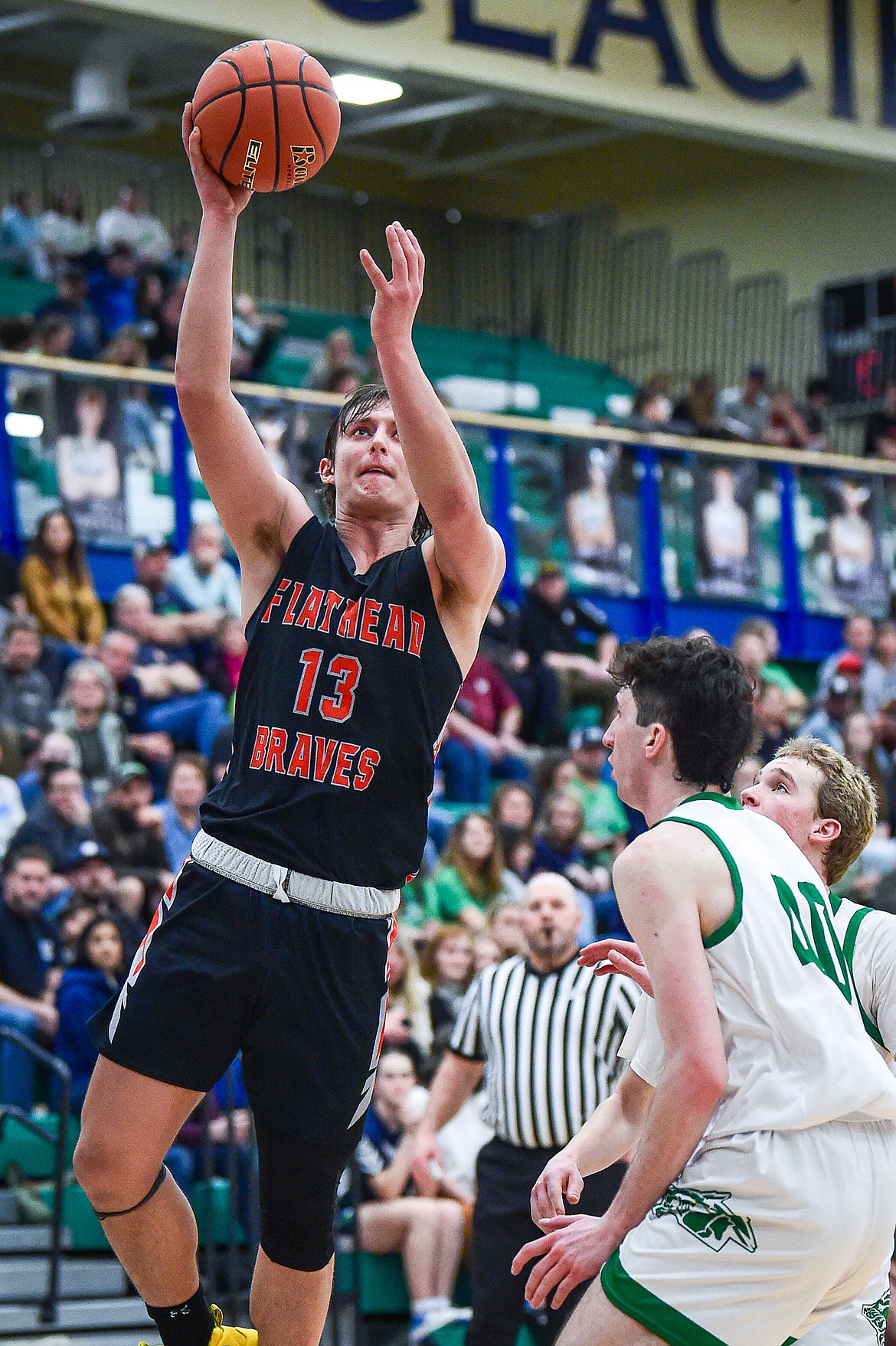 Flathead's Lyric Ersland (13) drives to the basket against Glacier in the second half at Glacier High School on Thursday, Feb. 1. (Casey Kreider/Daily Inter Lake)