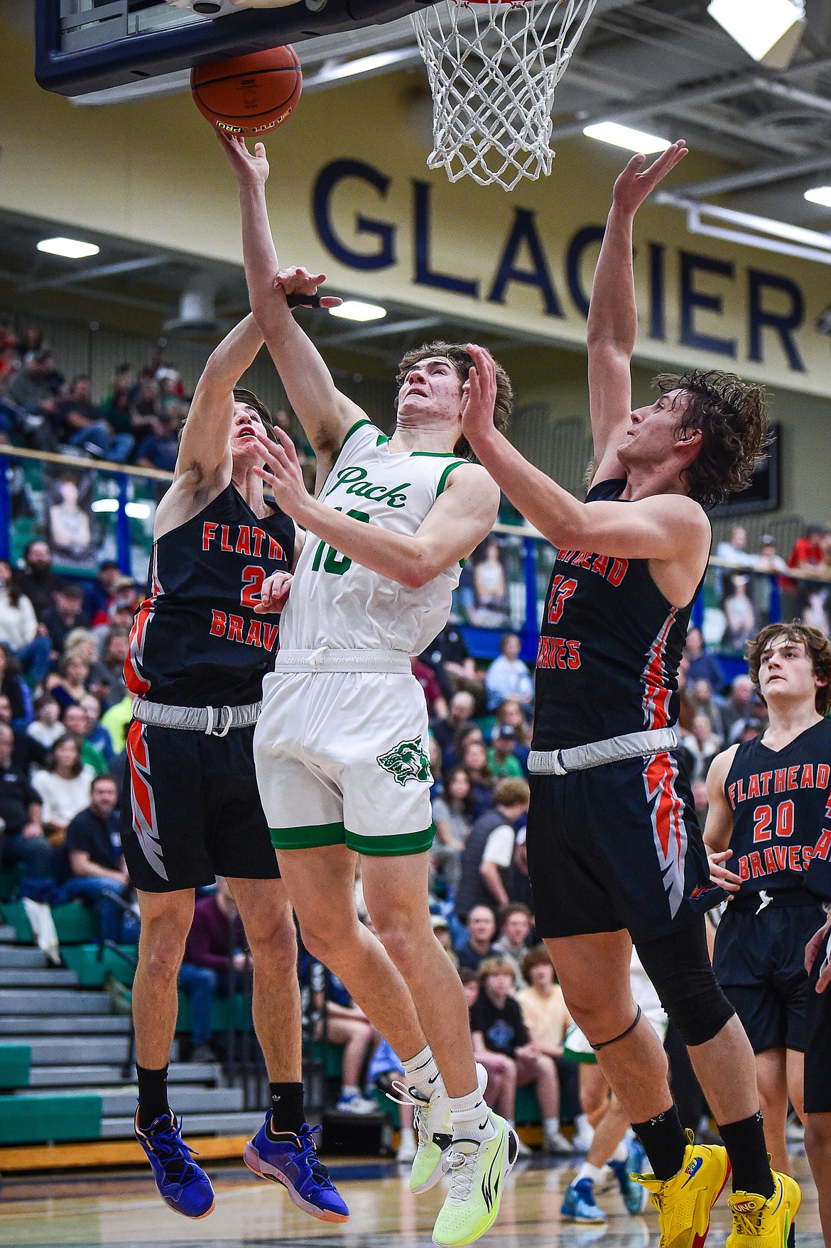 Glacier's Brantly Salmonsen (10) drives to the basket in the first half against Flathead at Glacier High School on Thursday, Feb. 1. (Casey Kreider/Daily Inter Lake)