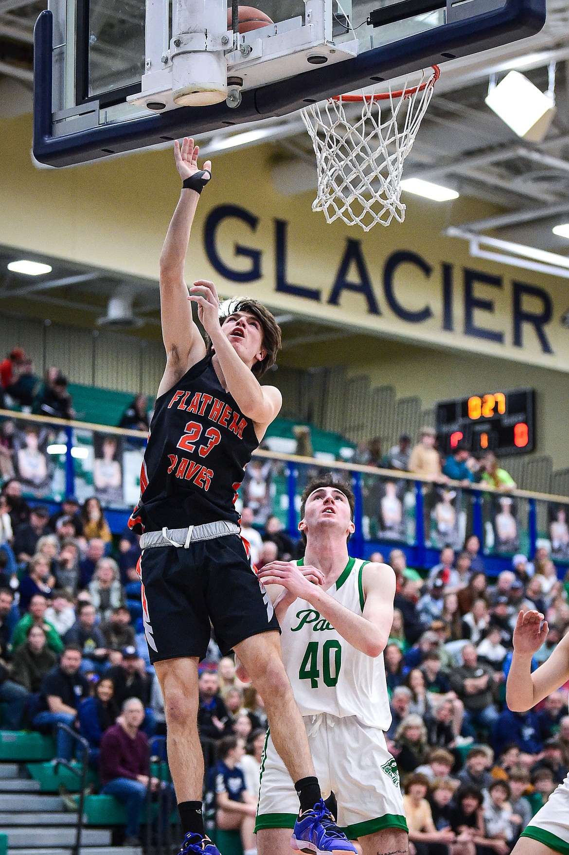 Flathead's Brody Thornsberry (23) drives to the basket in the second half against Glacier at Glacier High School on Thursday, Feb. 1. (Casey Kreider/Daily Inter Lake)