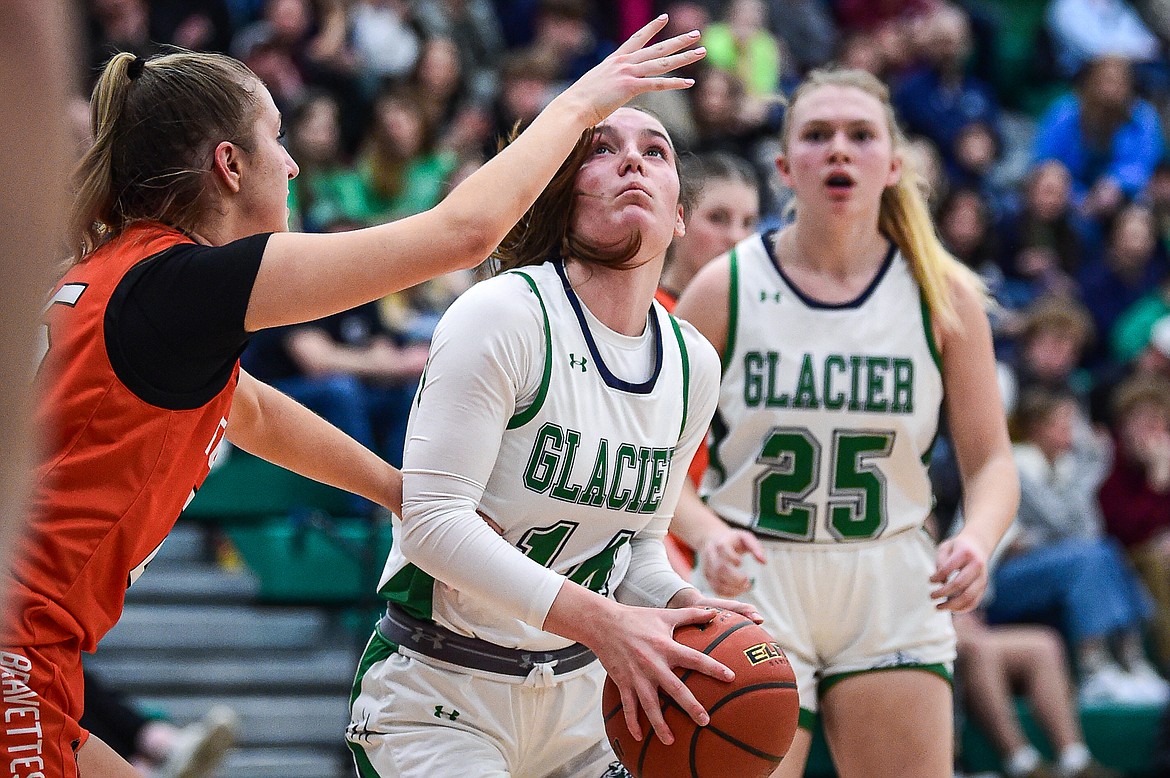 Glacier's Karley Allen (14) goes to the basket in the first half against Flathead at Glacier High School on Thursday, Feb. 1. (Casey Kreider/Daily Inter Lake)\