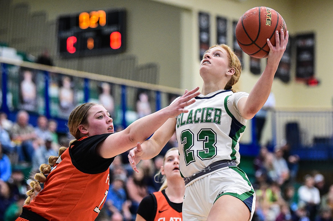 Glacier's Reese Ramey (23) drives to the basket in the first quarter against Flathead at Glacier High School on Thursday, Feb. 1. (Casey Kreider/Daily Inter Lake)