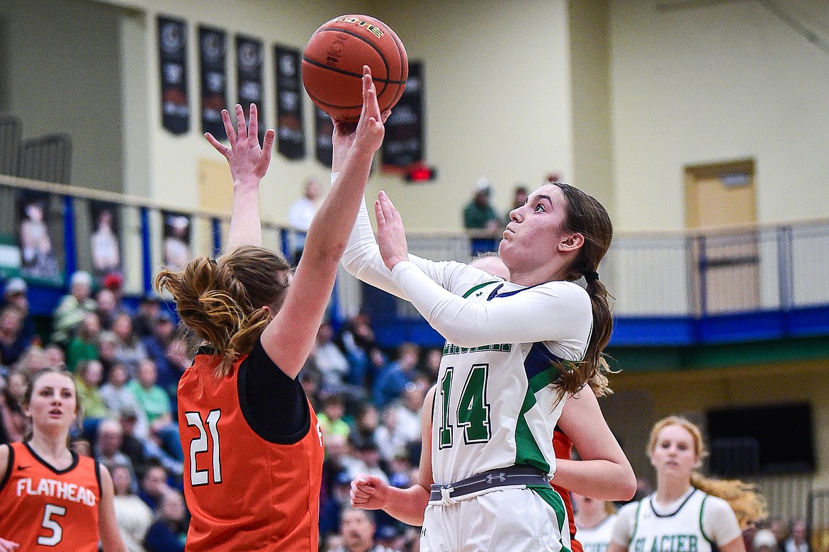 Glacier's Karley Allen (14) goes to the basket in the first half against Flathead at Glacier High School on Thursday, Feb. 1. (Casey Kreider/Daily Inter Lake)\