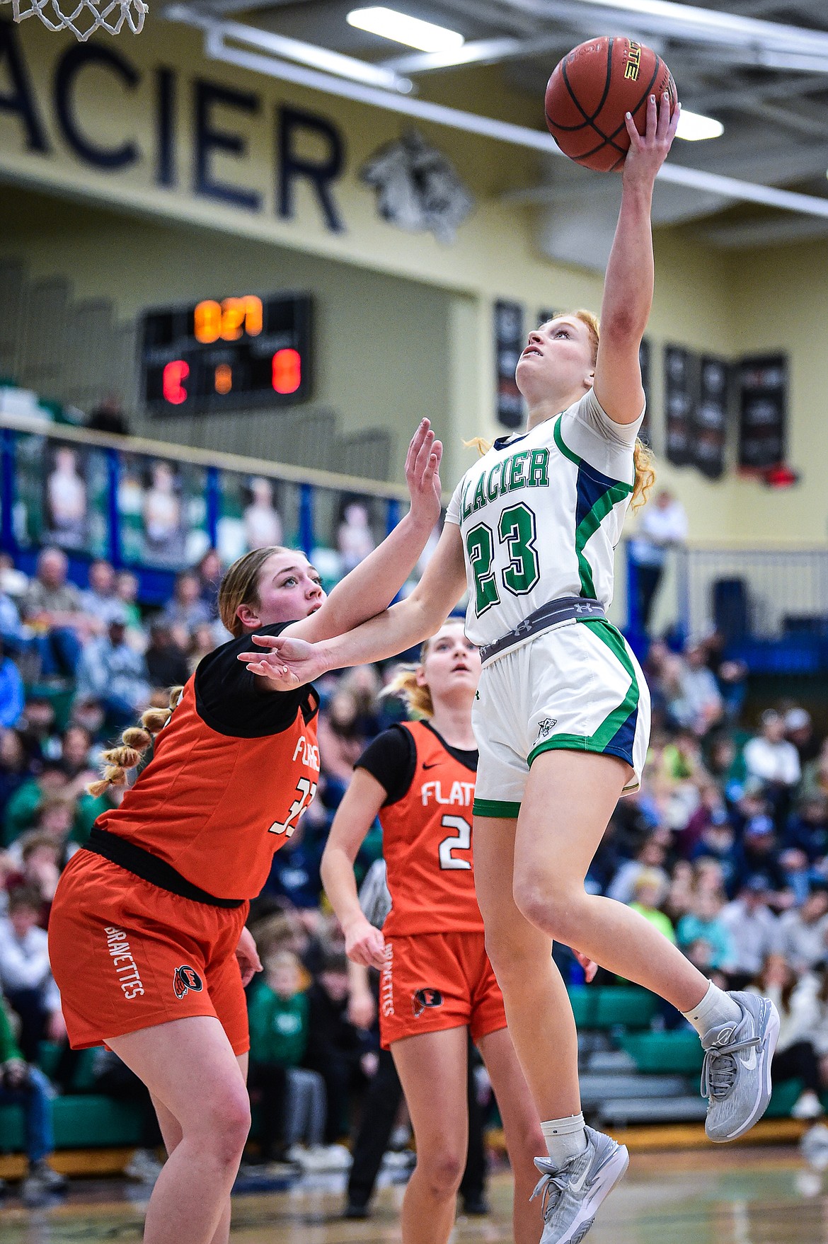 Glacier's Reese Ramey (23) drives to the basket in the first quarter against Flathead at Glacier High School on Thursday, Feb. 1. (Casey Kreider/Daily Inter Lake)