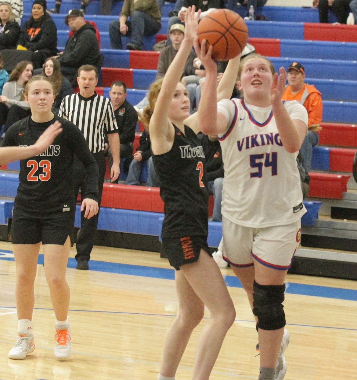 JASON ELLIOTT/Press
Coeur d'Alene junior Kelsey Carroll shoots as Post Falls senior Kinlee McLean defends during the third quarter of Friday's 5A Region 1 girls basketball tournament game at Viking Court.