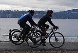 Bicyclists by the lake