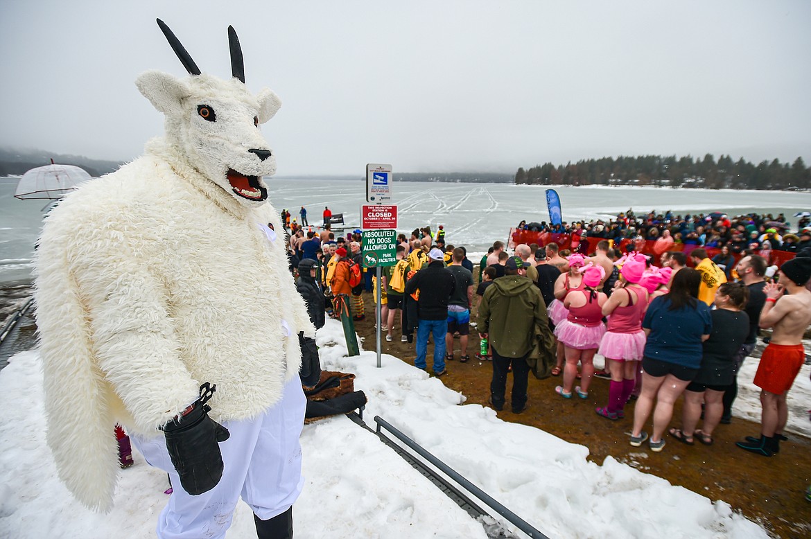Participants line up for the 23rd Penguin Plunge at City Beach in Whitefish on Saturday, Feb. 3. (Casey Kreider/Daily Inter Lake)