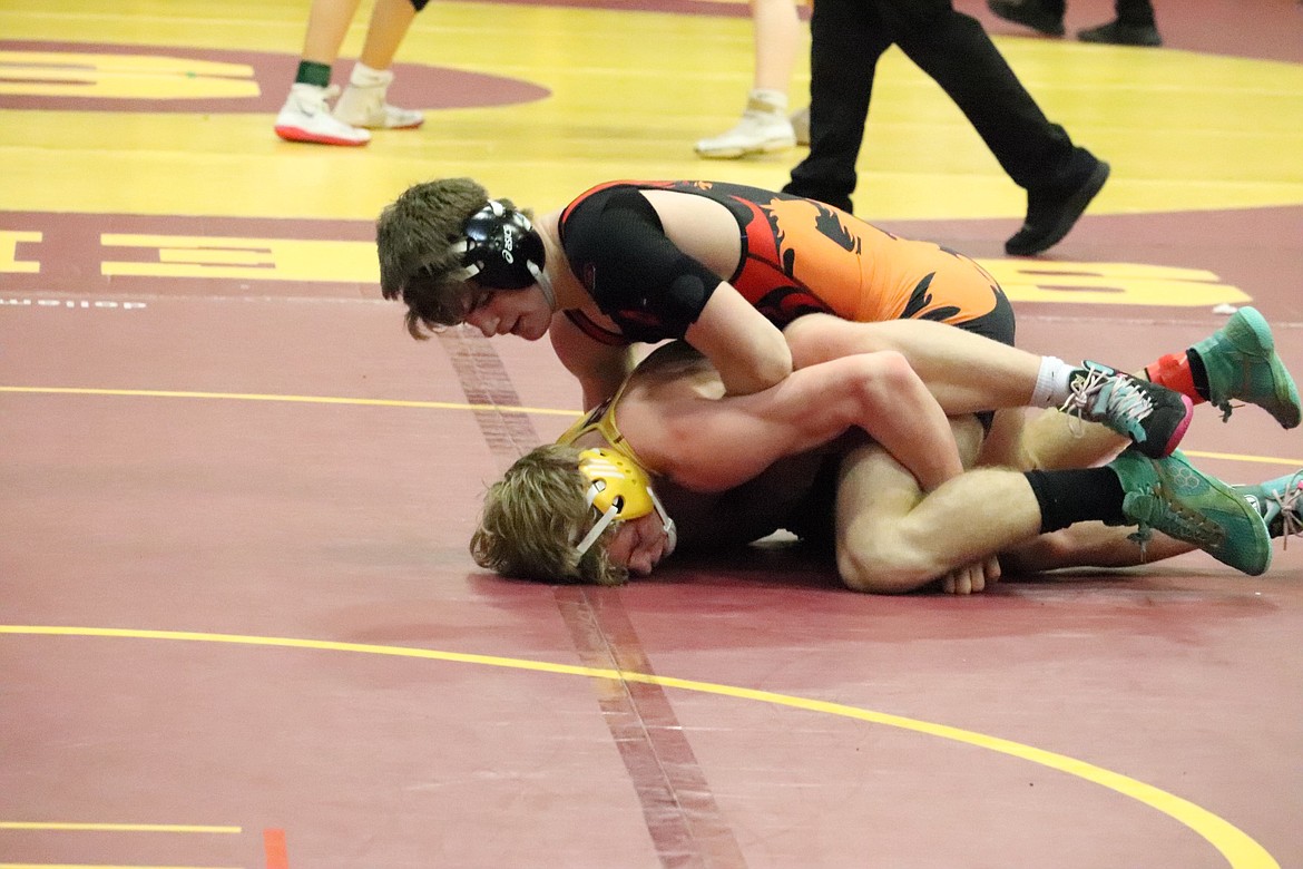 Hot Springs 152 pounder John Waterbury is in control during his match at this past weekend's Western Division B-C wrestling tournament in Shelby.  Waterbury won the weight class and advanced to the state finals next weekend in Billings. (Photo by Kami Milender)