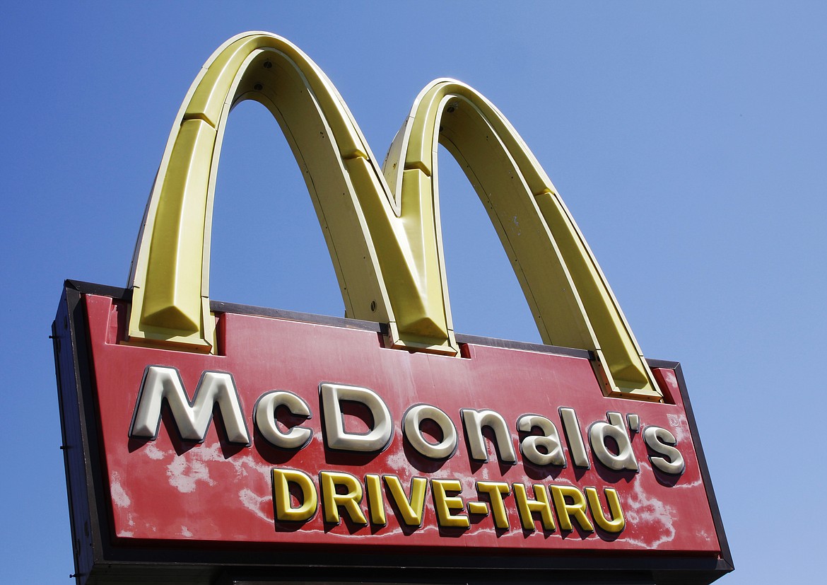 FILE - A McDonald's sign is displayed at a McDonald's restaurant in East Palo Alto, Calif., Friday, April 20, 2012. McDonald's reports earnings Monday, Feb. 5, 2024. (AP Photo/Paul Sakuma, File)