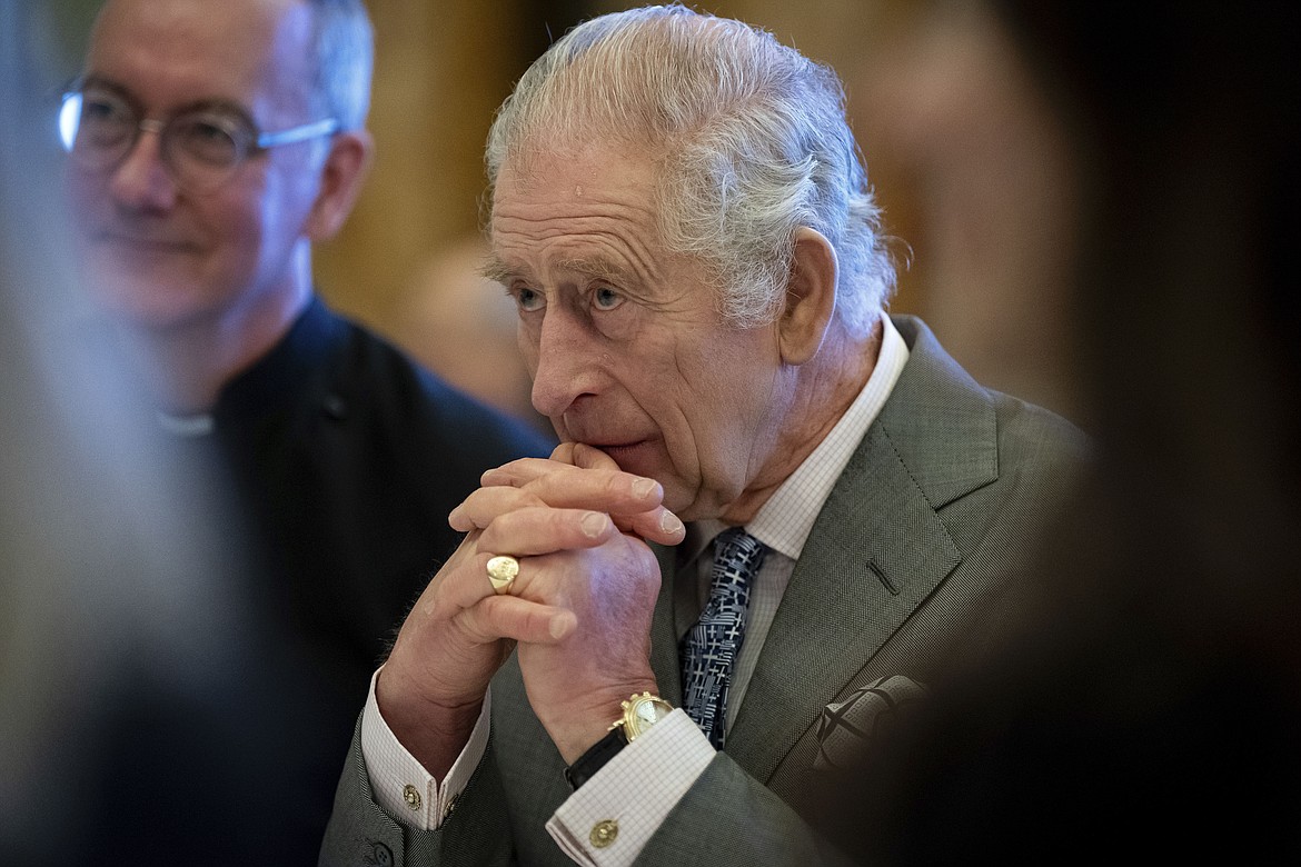 Britain's King Charles III hosts a gathering of young UK community and faith leaders to discuss the challenges their communities face, at Buckingham Palace, in London, Dec. 13, 2023. King Charles III has been diagnosed with a form of cancer and has begun treatment, Buckingham Palace says on Monday, Feb. 5, 2024. (Aaron Chown/Pool Photo via AP, File)