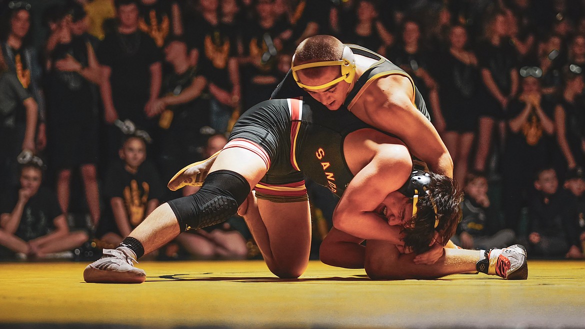 A Bulldog wrestler takes on a competitor in the recent annual Battle for the Paddle.