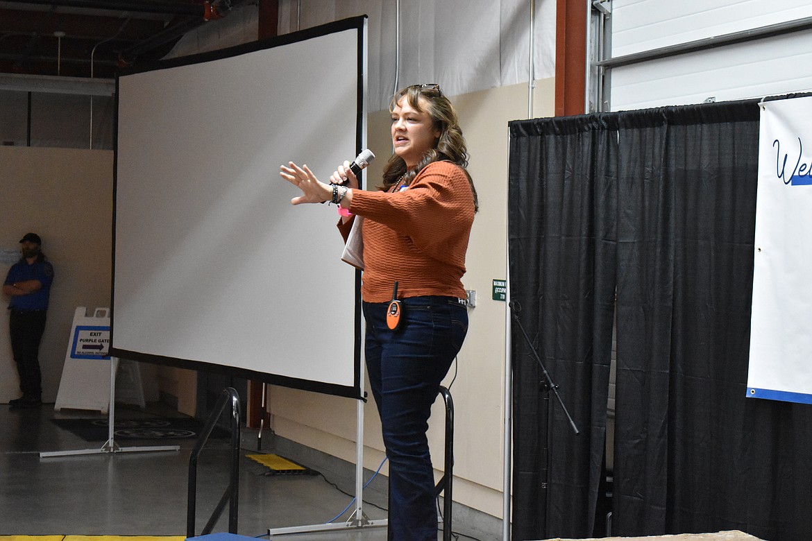 Columbia Basin Cancer  Foundation Director Angel Ledesma addresses the crowd at the Country Sweethearts Benefit Auction. This year’s event filled two buildings and seated about 540 people, Ledesma said, the largest event in the foundation’s history.