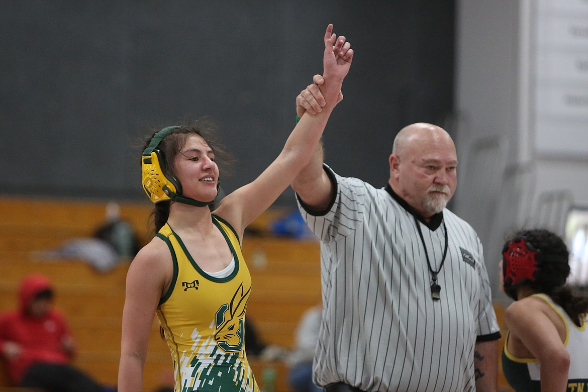 Quincy freshman Crystal Perez, left, won the 110-pound bracket at Saturday’s Girls 2A/1A/B District 6 Sub-Regional at Ephrata.