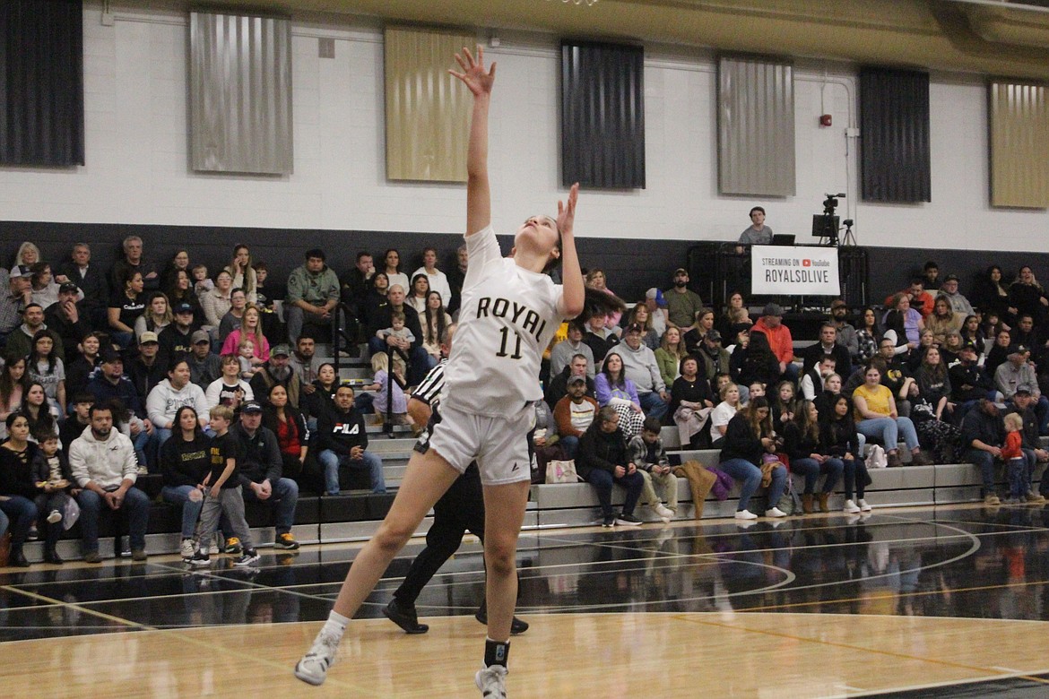 Royal’s Brianna Cedillo (11) goes up for the shot in the Knights’ 75-25 win over Wahluke Friday.