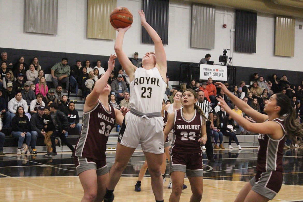 Royal’s Audrey Bergeson (23) puts back a rebound in the Knights’ game with Wahluke.