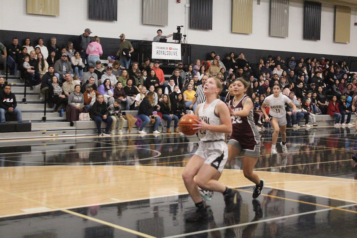 Briana Cedillo (11) heads to the basket on the breakaway.